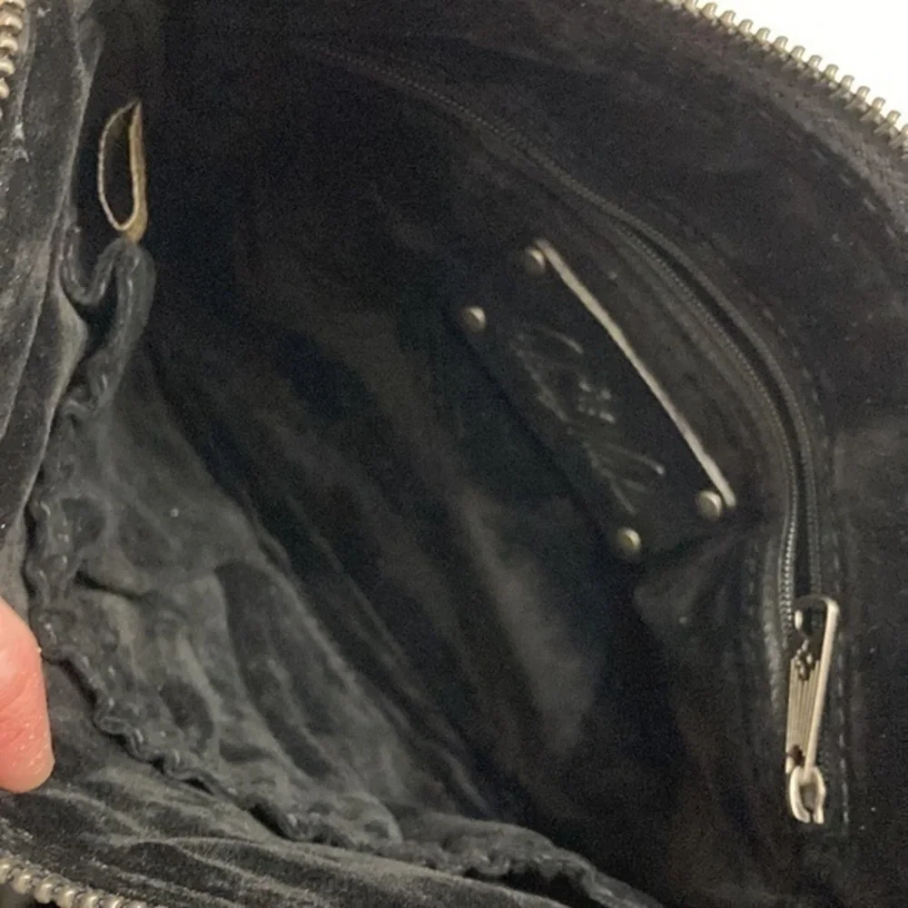 Patricia nash black embossed leather wristlet bag
